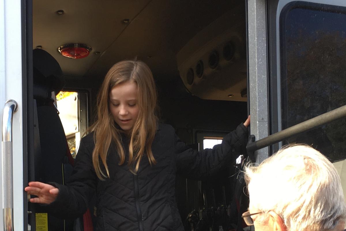 Cali , a third grader at Green Valley School checks out the inside of Engine 1 during a school visit on on October 20, 2016 (Photo courtesy of Green Valley School)