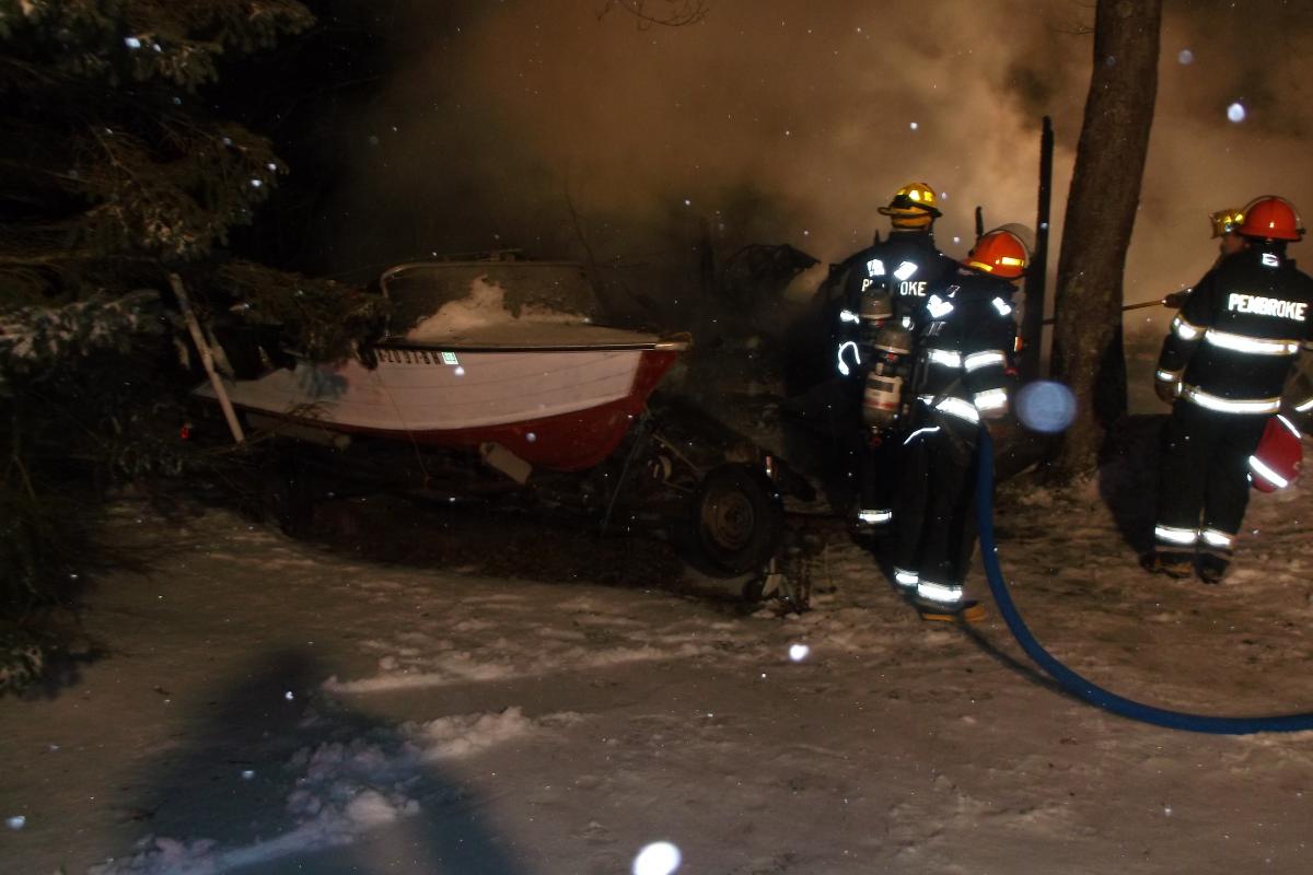 Pembroke Firefighters extinguish a shed fire on Beacon Hill Road