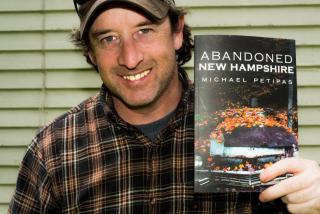 Picture of Michael Petipas with his book Abandoned New Hampshire.